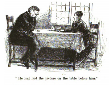 “He had laid the picture on the table before him.”