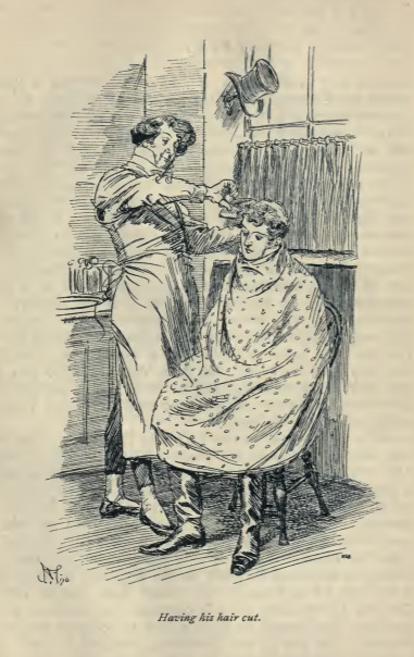 Having his hair cut