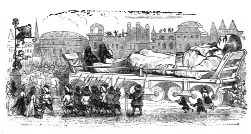 [Gulliver being brought into the town from the shore on a gurney in Lilliput]